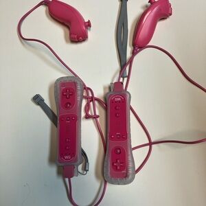 Pink Wii Remote Controllers with Nunchuks